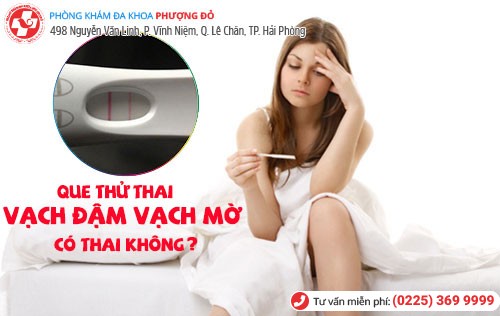 que thử thai vạch đậm vạch mờ